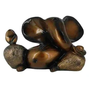 Stylish brown reclining Ganesh idol – Modern marble dust Ganpati murti for home decor and pooja