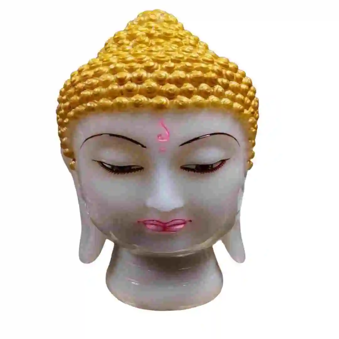 Golden Buddha head idol with peaceful expression made from marble dust for home or office decor